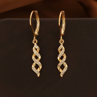 Schimmer Drehung Ava Ohrringe | Gold
